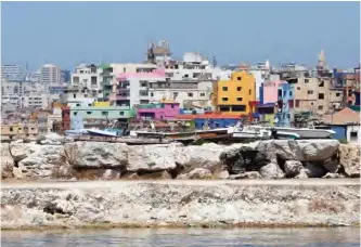  ??  ?? A general view shows painted houses in Beirut's southern Ouzai neighborho­od. — AFP photos