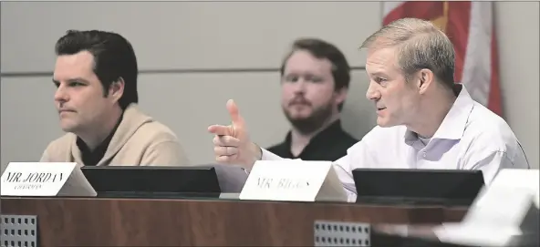  ?? ?? U.S. HOUSE JUDICIARY COMMITTEE CHAIRMAN JIM JORDAN (R-OHIO) (RIGHT) makes opening remarks at the start of Thursday afternoon’s hearing, “The Biden Border Crisis: Part II,” inside the Yuma City Hall council chambers, One City Plaza. Rep. Matt Gaetz (R-fla.) (left) listens to Jordan’s remarks.