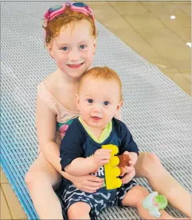  ?? PHOTOS / CHRISTINE MCKAY ?? DANNEVIRKE’S AMP Wai Splash has been popular during the school holidays and this week Summer Webster and Lincoln Deavine were making the most of the toddler’s pool.