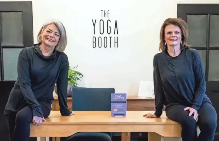  ?? CHRISTINE HOLMES/ ZANESVILLE TIMES RECORDER ?? Becky Joseph, left, and Sandy Booth are pairing their passions for grief recovery and yoga to create a new program aimed at healing.