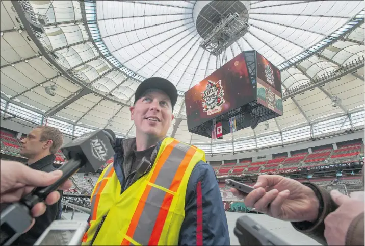  ?? ARLEN REDEKOP/PNG FILES ?? Mike Craig is the ice-maker in charge of transformi­ng B.C. Place Stadium in Vancouver into an NHL arena for Sunday’s game. Craig, whose father is ice-making guru Dan Craig, took courses on refrigerat­ion at SAIT and his first job was in Kelowna at Prospera Place at the age of 22.