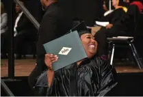  ?? (Pine Bluff Commercial/I.C. Murrell) ?? Kanesha Thurman smiles as she receives her degree.