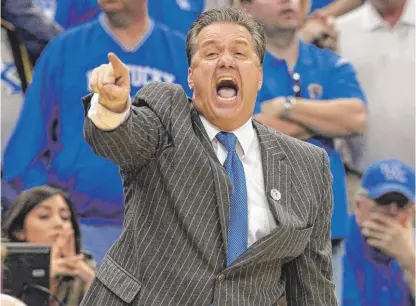  ?? | TIMOTHY D. EASLEY/ AP ?? Kentucky coach John Calipari has had his share of run- ins with the NCAA, yet has emerged smelling like a rose.