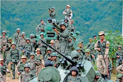  ?? AFP ?? Venezuelan troops in different fatigues attend the Press conference by Defence Minister Vladimir Padrino Lopez in Caracas. —