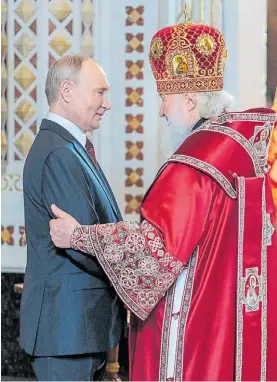  ?? AP ?? Saludo. Putin con Kiril, el patriarca de la iglesia ortodoxa rusa.