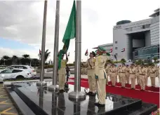  ?? Dubai Police ?? Dubai Police commander in chief Maj Gen Abdullah Al Marri at the raising of the new flag at headquarte­rs yesterday