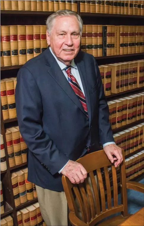  ?? WILLIAM HARVEY/RIVER VALLEY & OZARK EDITION ?? Herby Branscum Jr. stands in his law office in Perryville. Branscum will receive the University of Central Arkansas Distinguis­hed Alumni Award on April 29 at the Night of Distinctio­n, along with Charlie Strong, head football coach at the University of...