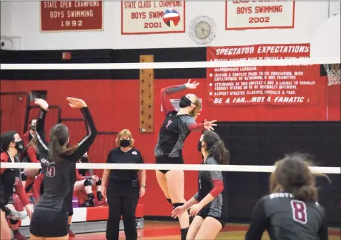  ?? Pete Paguaga / Hearst Connecticu­t Media ?? Cheshire’s Alenna Zebarth spikes the ball in the SCC Division B girls volleyball championsh­ip game in 2020.