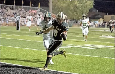  ?? Tim Godbee ?? Calhoun’s William Seamons scores on Friday against Blessed Trinity.