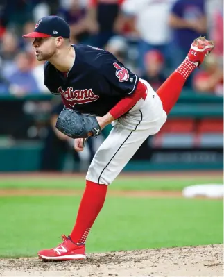  ??  ?? Cleveland Indians starting pitcher Corey Kluber delivers against the Detroit Tigers during the ninth inning in a baseball game, Tuesday in Cleveland. (AP)