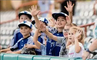  ?? James Franco / Special to the Times Union ?? Young fans are seen enjoying the Tri-city Valleycats’ game against the Sussex County Miners on Saturday night at Joseph L. Bruno Stadium in Troy.