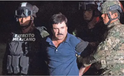  ?? REBECCA BLACKWELL, AP ?? Mexican drug lord Joaquín “El Chapo” Guzmán is escorted by soldiers to a helicopter in Mexico City after his recapture in January 2016 following his escape from prison.