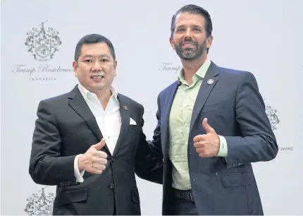  ?? BLOOMBERG ?? Donald Trump Jr, executive vice president of developmen­t and acquisitio­ns for Trump Organizati­on, right, and Hary Tanoesoedi­bjo, founder and chairman of MNC Group, give a thumbs-up during a news conference in Jakarta yesterday.