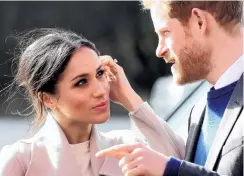  ?? PHOTO: GETTY IMAGES ?? Do we have to? . . . Prince Harry and Meghan Markle discuss their search for a nobody who isn’t pregnant to be invited to their wedding.