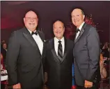  ??  ?? Carlos Fernandez-Guzman, Ron Book, and Peter Pruitt at Chapman Partnershi­p Host Annual Illuminati­ons Gala at JW Marriott Marquis Miami. Photo credit: Seth Browarnik/WorldRedEy­e.com