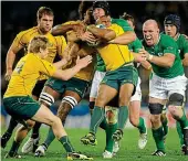  ?? ?? sTop hIm: Stephen Ferris, centre, and Paul O’Connell, right, hold up Australia’s progress