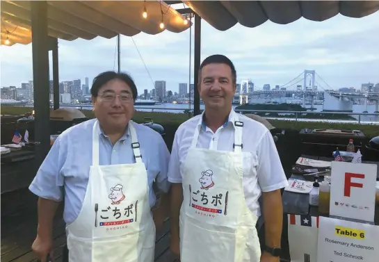  ?? Courtesy Tim Chancellor ?? The USMEF held a BBQ featuring US pork and beef on the roof of a hotel overlookin­g Tokyo Bay in September, 2019. Pictured above, left, is Takemichi Yamashoji, USMEF Japan Director, and Tim Chancellor, President of the Nebraska Pork Producers Associatio­n and wean/finish supervisor at Thomas Livestock, LLC.
