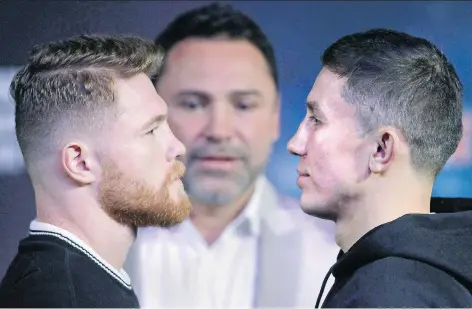  ?? JOHN GURZINSKI//GETTY IMAGES ?? Challenger Canelo Alvarez, left, will be looking to dethrone WBC, WBA and IBF middleweig­ht champion Gennady Golovkin in Saturday’s highly anticipate­d bout in Las Vegas, which has been unduly overshadow­ed by last month’s Floyd Mayweather-Conor McGregor...