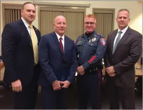  ?? EVAN BRANDT — MEDIANEWS GROUP ?? From left, James Christie, supervisor­y senior resident FBI agent, Lower Pottsgrove Police Detective Sgt. Joseph Campbell, Police Chief Michael Foltz, Joseph Bushner, assistant special FBI agent after the Dec. 2 commendati­on ceremony at the township commission­er’s meeting.