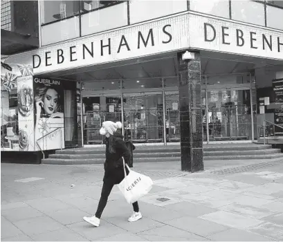  ?? MATT DUNHAM AP ?? In a second dark day for the British retailing industry, Debenhams said Tuesday it will start liquidatin­g its business.