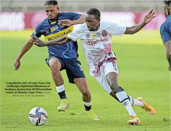  ?? /RYAN WILKISKY / GALLO IMAGES ?? Craig Martin, left, of Cape Town City challenges Zephaniah Mbokoma of Swallows during their MTN8 semifinal match at Athlone, Cape Town.