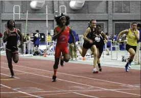  ?? PAT EATON-ROBB / AP ?? Bloomfield High transgende­r athlete Terry Miller (second from left) wins the 55-meter dash over transgende­r athlete Andraya Yearwood (far left) and other runners at a girls track meet in Connecticu­t . Transgende­r athletes would be blocked from participat­ing in girls sports under a federal lawsuit filed Feb. 12.