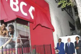  ?? ?? Minister of Finance and the Public Service Dr Nigel Clarke (left) leads the CIBC logo unveiling alongside CIBC Executive Vicepresid­ent, Purpose, Brand, and Corporate Affairs Stephen Forbes (centre); and CIBC Jamaica Managing Director Nigel Holness.