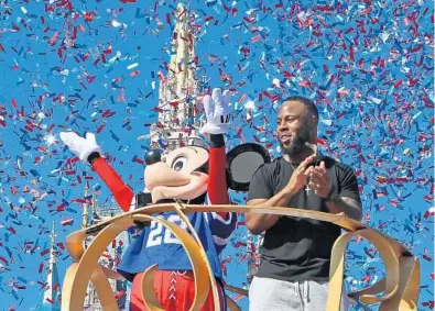  ?? RED HUBER/STAFF PHOTOGRAPH­ER ?? Super Bowl hero James White spent the day Monday at Magic Kingdom in Orlando the day after scoring the winning touchdown in overtime to cap a day with career highs of 14 catches for 110 yards, 29 yards rushing and three touchdowns.