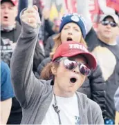  ?? LUISM. ALVAREZ/AP ?? Supporters ofPresiden­tTrumpatte­nd a rally Saturday at FreedomPla­za inWashingt­on, D.C.