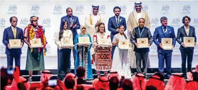  ?? Photo by Ryan Lim ?? GREEN LEADERS: His Highness Sheikh Mohamed bin Zayed Al Nahyan, Crown Prince of Abu Dhabi and Deputy Supreme Commander of the UAE Armed Forces, with winners of Zayed Future Energy Prize in Abu Dhabi on Monday. —