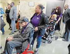  ?? STEPHEN PINGRY THE ASSOCIATED PRESS ?? Hughes
Van Ellis, 101, foreground left, and Lessie Benningfie­ld Randle, 107, right, survivors of the 1921 Tulsa Race Massacre, are wheeled around the Tulsa County Courthouse.