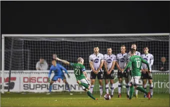  ??  ?? Gary McCabe of Bray Wanderers takes a free against Dundalk.