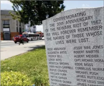  ?? SETH WENIG - THE ASSOCIATED PRESS ?? In this June 28 photo, a monument commemorat­es the Newark riots of 1967, in Newark, N.J. Fifty years ago Newark became the center of black rage after a black cab driver was badly beaten by white officers. The incident sparked four days of deadly...