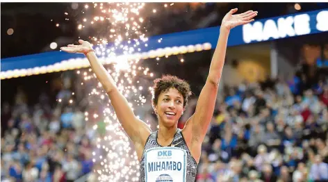  ?? FOTO: STACHE/DPA ?? Malaika Mihambo jubelt nach ihrem Sprung auf 7,07 Meter beim Istaf Indoor in Berlin. Die Weitspring­erin ist auch bei der DM die große Favoritin.