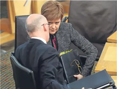  ?? Picture: Andrew Milligan/PA Wire. ?? Nicola Sturgeon talks with Education Secretary John Swinney.