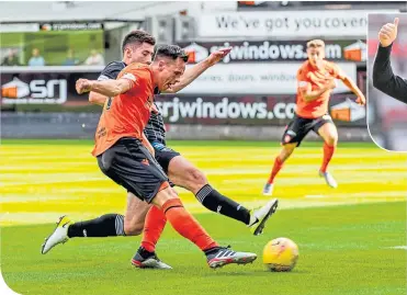  ??  ?? Dundee United’s Lawrence Shankland scores the first of his double to make it 1-0