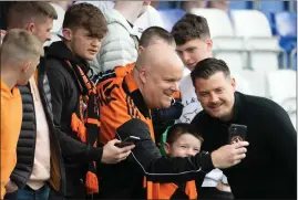  ?? ?? Tam Courts poses with fans after the win over Ross County