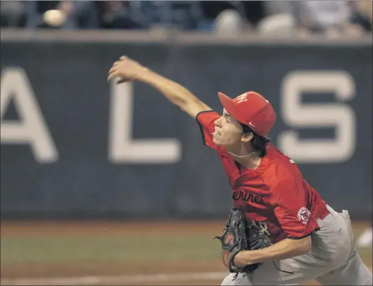  ?? PHOTOS BY PAUL RODRIGUEZ ?? Harvard-Westlake’s Christian Becerra threw a one-hitter to lead the Wolverines to a 3-0win over JSerra in the CIF Southern Section Division 1title game on Saturday night.