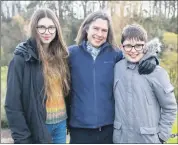  ?? Michael O’Sullivan) (Pic: ?? Cressida Williams, daughter of the former owners, with her children, Naomi and Matthew, at the opening in Castletown­roche on Thursday.