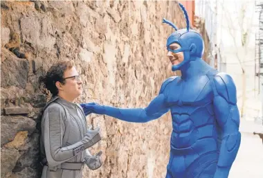  ?? JESSICA MIGLIO, AMAZON ?? Arthur ( Griffin Newman) is an accountant who finds himself in the world inhabited by The Tick ( Peter Serafinowi­cz).