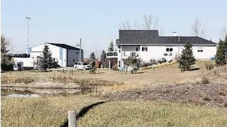  ?? RYAN RUMBOLT ?? This property near Aldersyde, 55 kilometres south of Calgary, is being searched by police in connection with the disappeara­nce of Adam Stewart Young, 35, who was last seen 11 months ago.