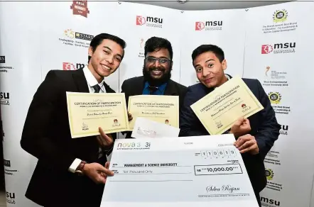  ??  ?? MSU’s winning team which comprises (from left) Amirul Hakimi, Muralithev­an and Muhammad Malik Fahd.