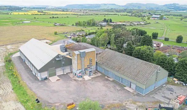  ??  ?? MONEY TROUBLES: Administra­tors are looking to dispose of Alexander Inglis & Son’s assets, which include a major grain store in Errol, pictured.