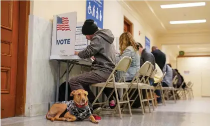  ?? ?? People vote at San Francisco city hall in California on 5 March 2024. Photograph: Loren Elliott/Reuters