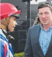  ?? ?? Jockey Michael Murphy chats to trainer Ben Currie at Doomben in November, 2017.