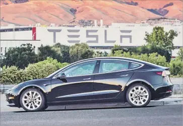  ?? Tesla ?? THE MODEL 3 is equipped with eight cameras, a radar unit and 12 ultrasonic sensors. Triggering the software to make Enhanced Autopilot driver-assist technology work costs $5,000 on top of the $35,000 base price.