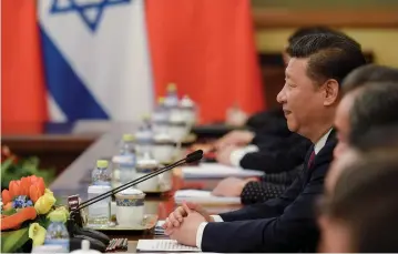  ?? (Reuters) ?? CHINESE PRESIDENT Xi Jinping looks on during his meeting with Prime Minister Benjamin Netanyahu at the Diaoyutai State Guesthouse in Beijing last week.