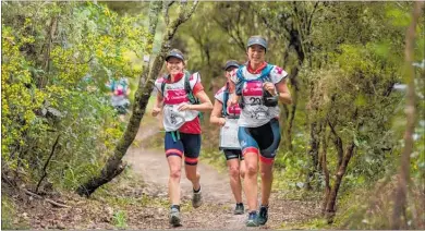  ?? Photo / Supplied ?? Despite having never raced together before team 5 Minutes Peace, pictured here on a hiking stage of Spring Challenge Taupo¯ last Saturday, won the 9-hour category.