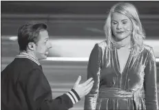  ?? AP PHOTO ?? In this photo taken Monday, French DJ and musician Martin Solveig, left, talks to Olympique Lyonnais’ Ada Hegerberg of Norway during the Golden Ball (Ballon d’Or) award ceremony at the Grand Palais in Paris. After asking the first woman to win the Ballon d’Or if she twerked, French DJ Martin Solveig then said sorry.