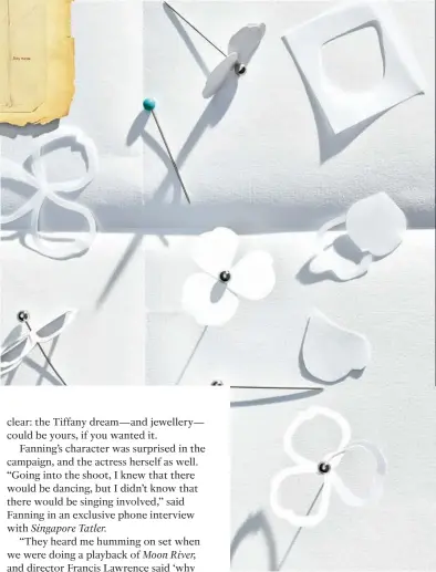 ??  ?? PAPER PLAY While creating the collection, chief artistic officer Reed Krakoff began with real paper flowers, placing together one petal at a time. The real challenge came in translatin­g the delicacy and flexibilit­y of paper into platinum—which Tiffany did admirably well. The wax prototypes (opposite, far right) were key to achieving this